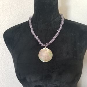 Beaded necklace with shell pendant